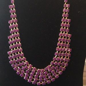 Purple and gold necklace.